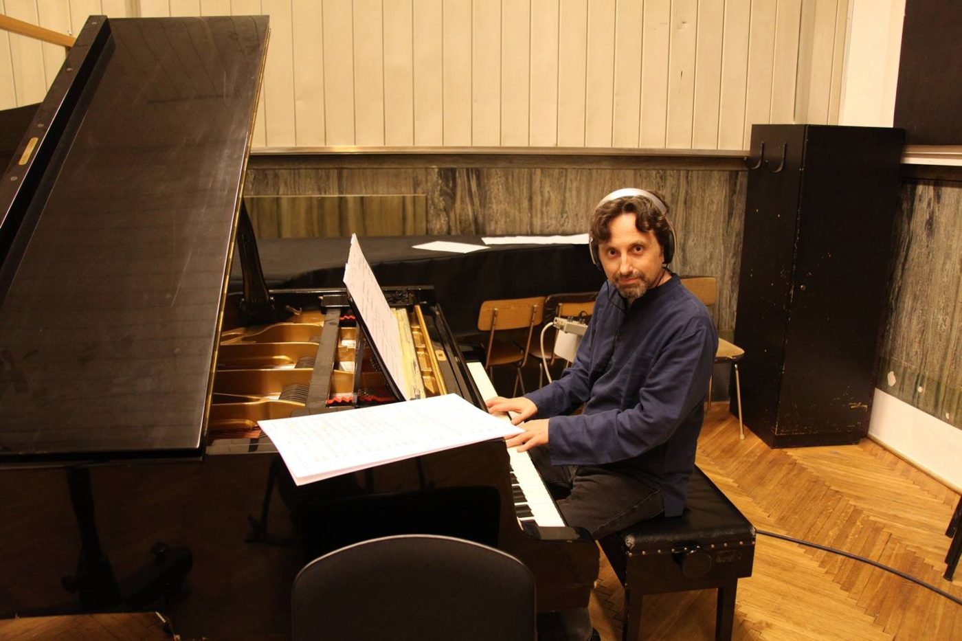 At the piano in a recording studio